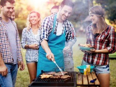 a group of people at a BBQ