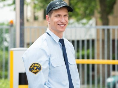 a smiling security guard