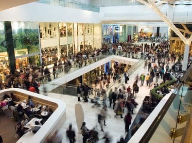 a crowd at a shopping mall