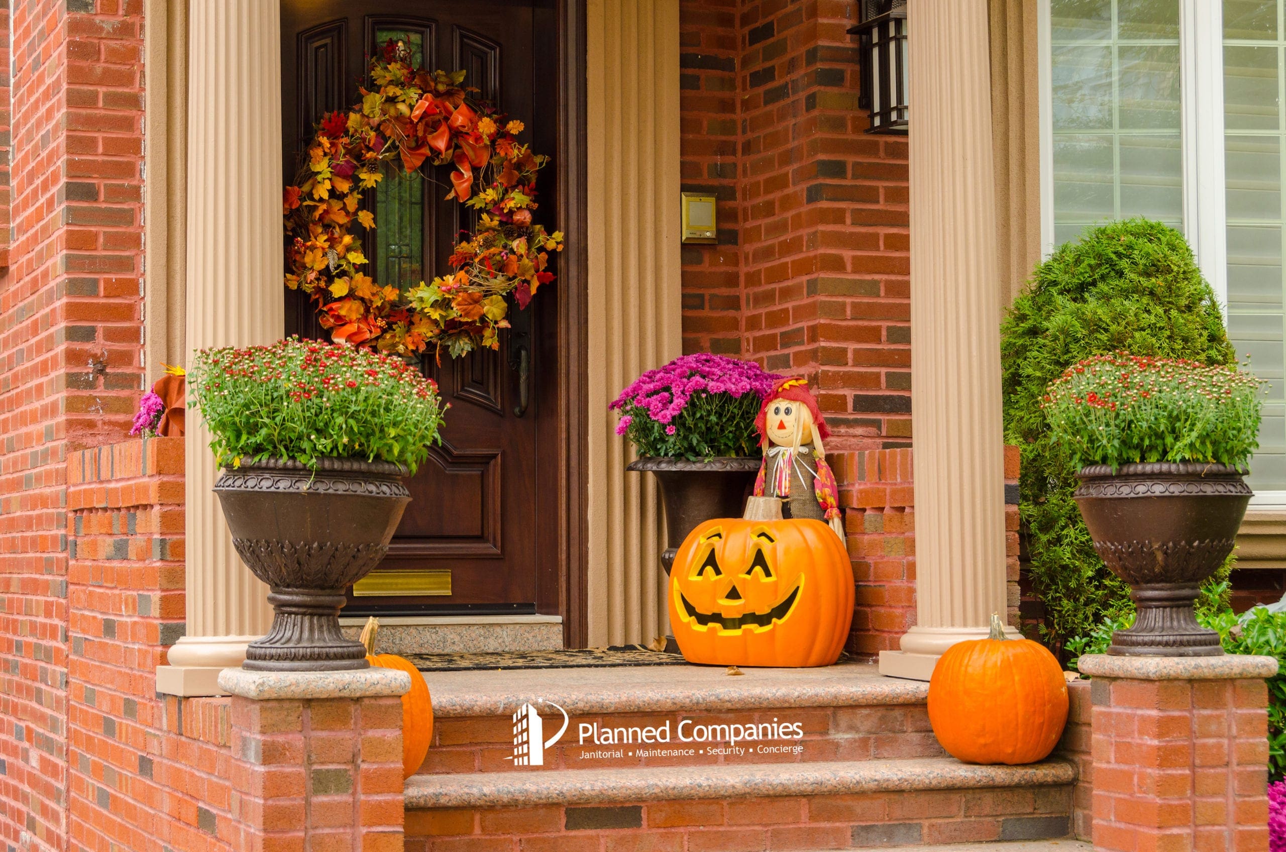 a doorstep with a Halloween pumpkin