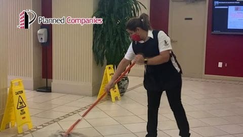 janitor mopping floor